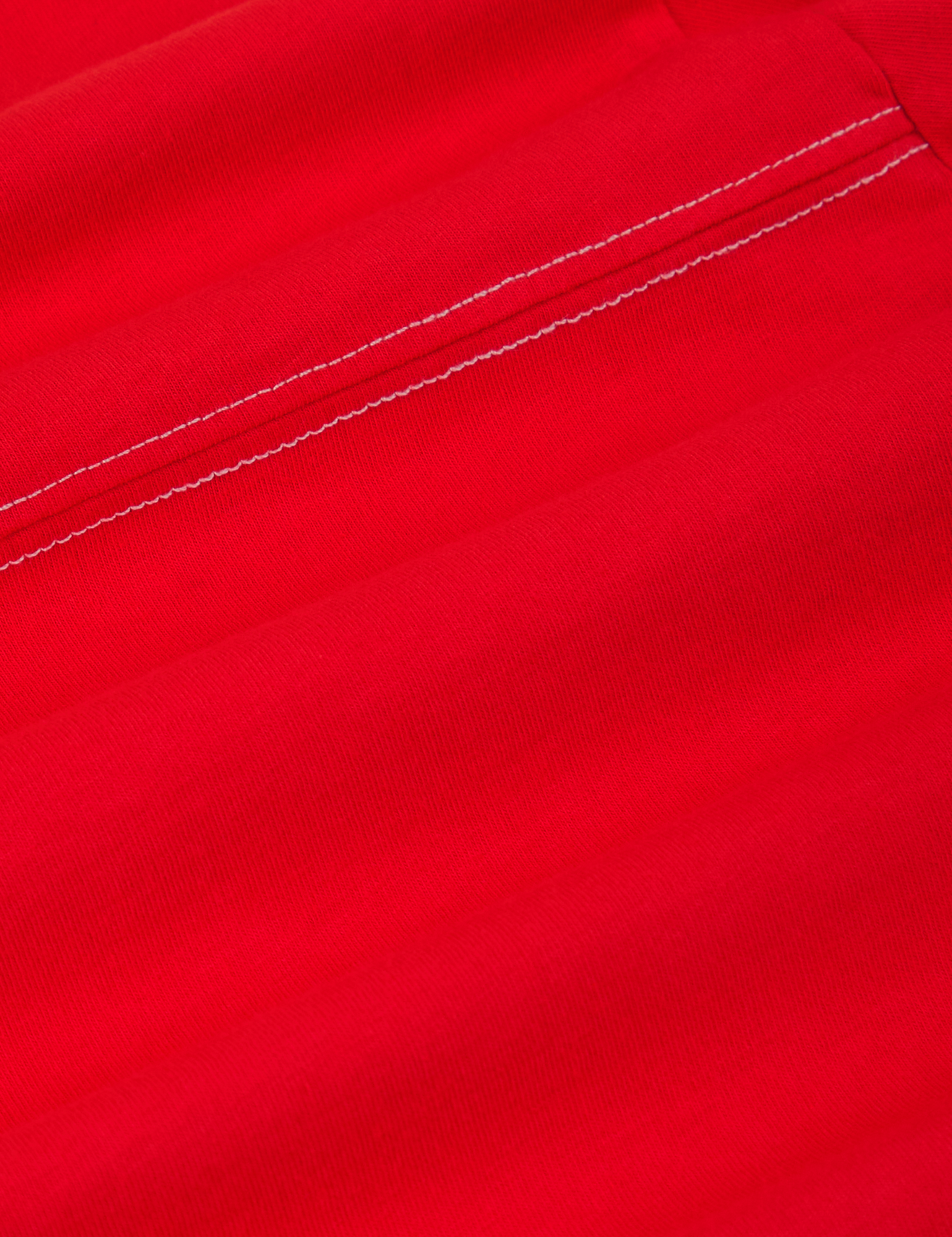 JV Tee in Mustang Red fabric detail close up