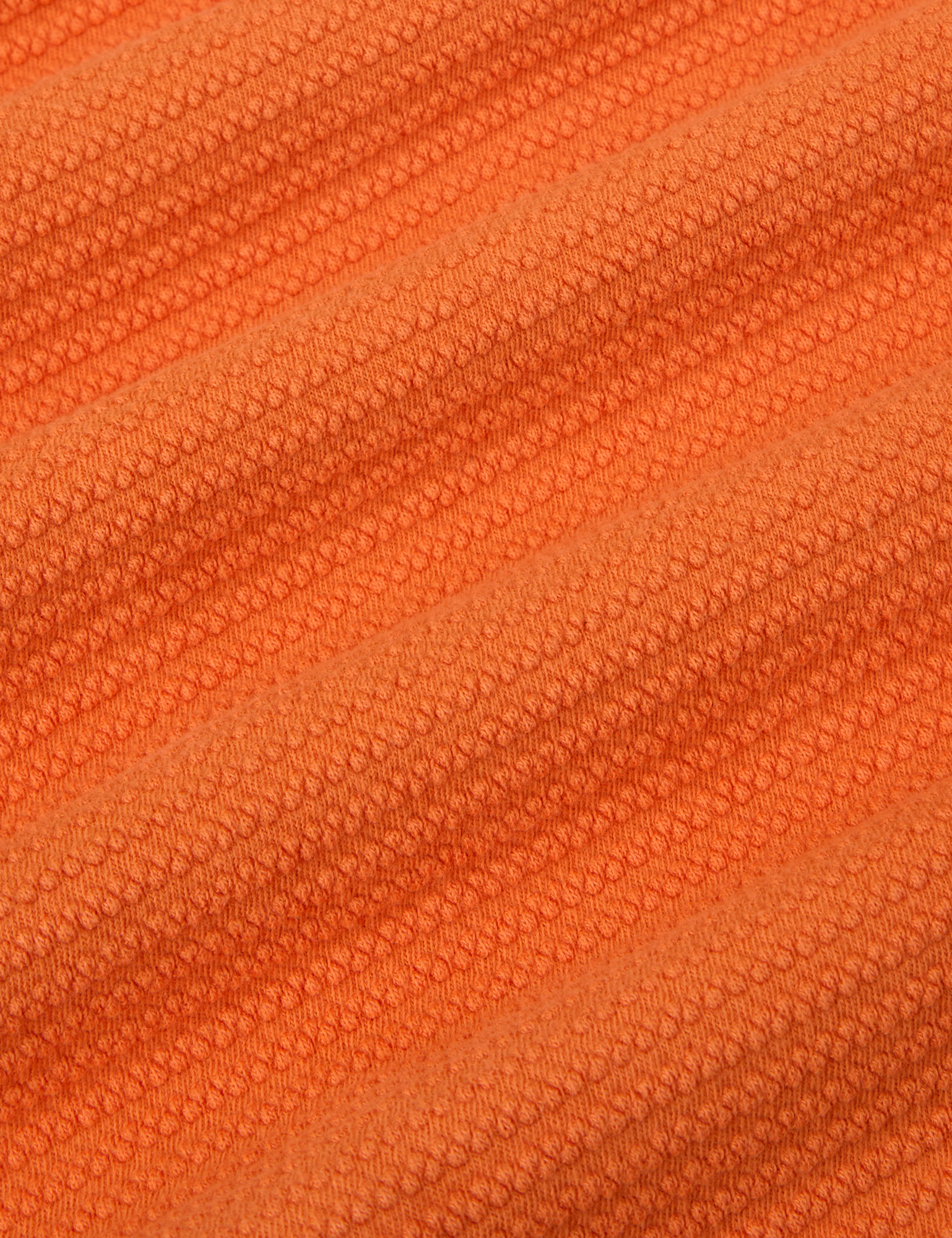 Honeycomb Thermal in Construction Orange fabric detail close up