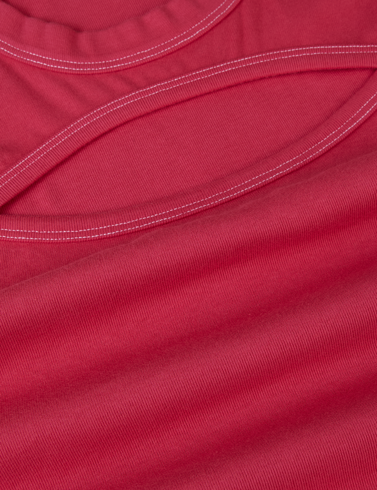 Fabric close up of the Hot Pink Long Sleeve Porthole Tee