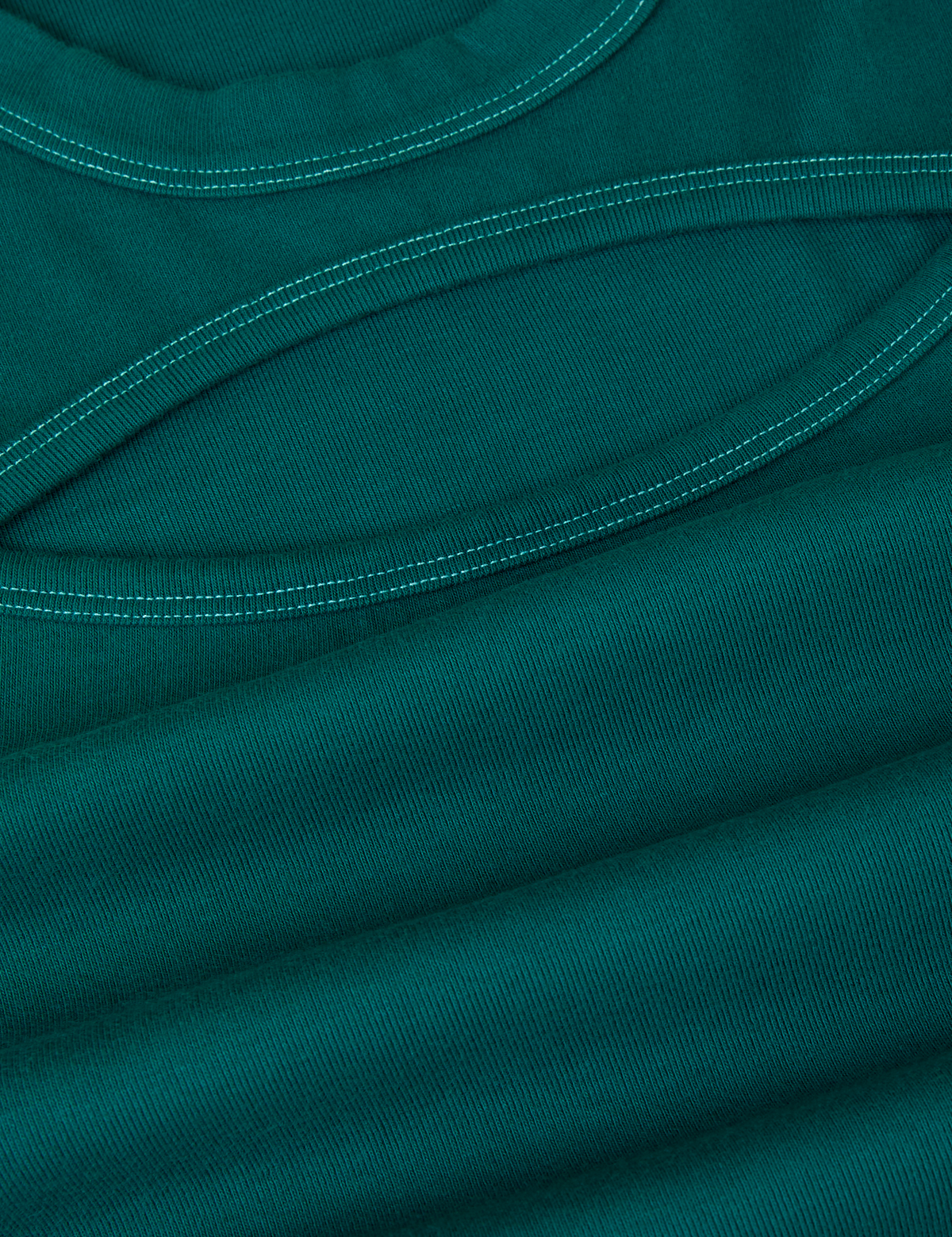 Fabric close up of the Hunter Green Long Sleeve Porthole Tee