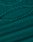 Fabric close up of the Hunter Green Long Sleeve Porthole Tee