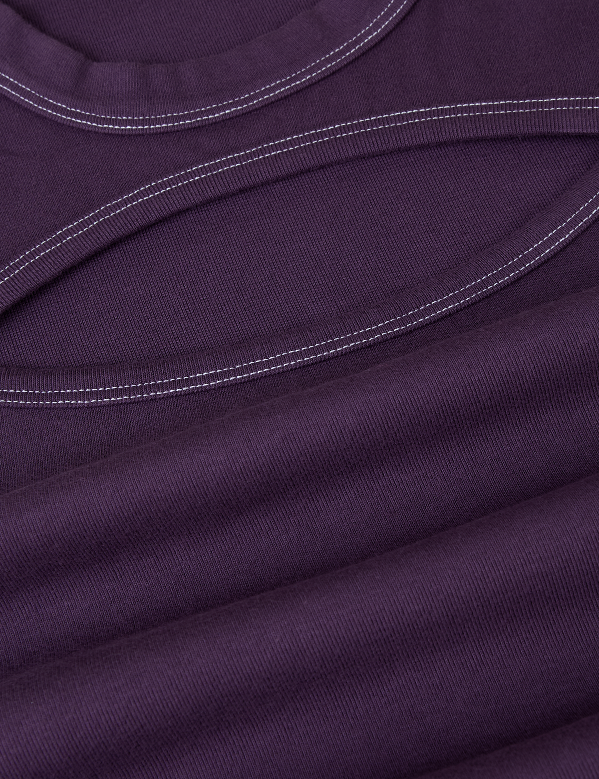 Fabric close up of the Nebula Purple Long Sleeve Porthole Tee