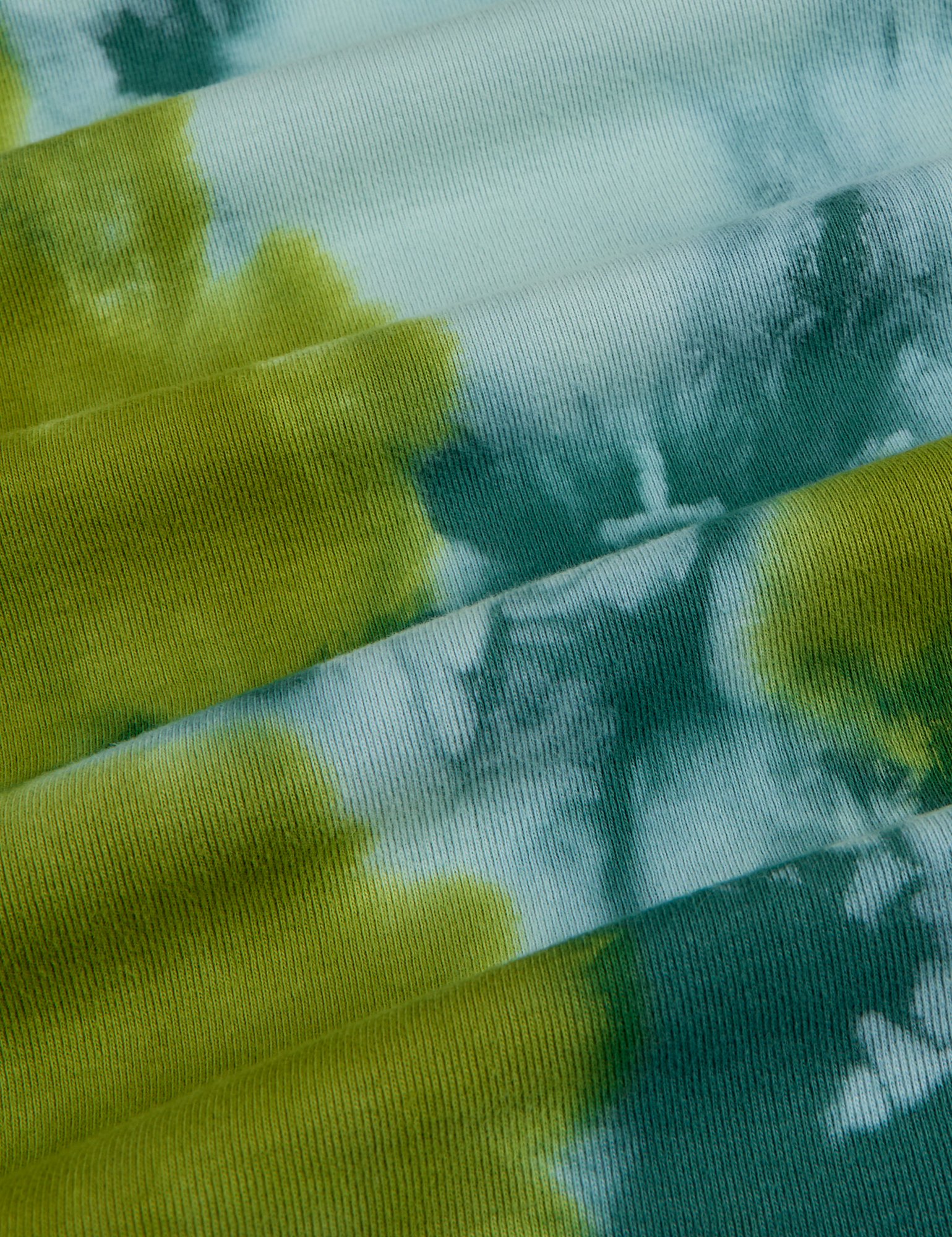 Long Sleeve Baby Tee in Green Magic Waters fabric detail close up