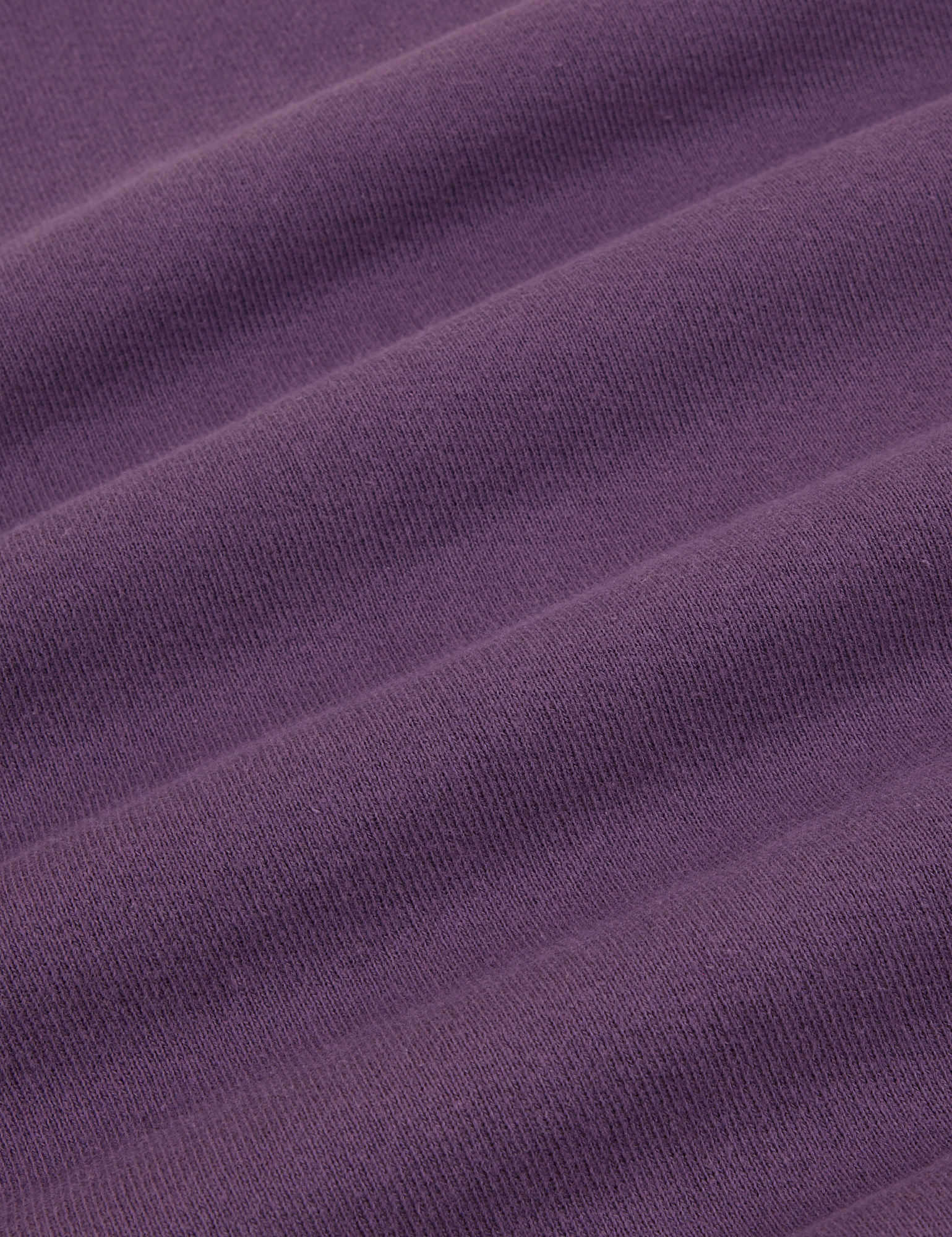 Cropped Rolled Cuff Sweatpants in Nebula Purple fabric detail close up
