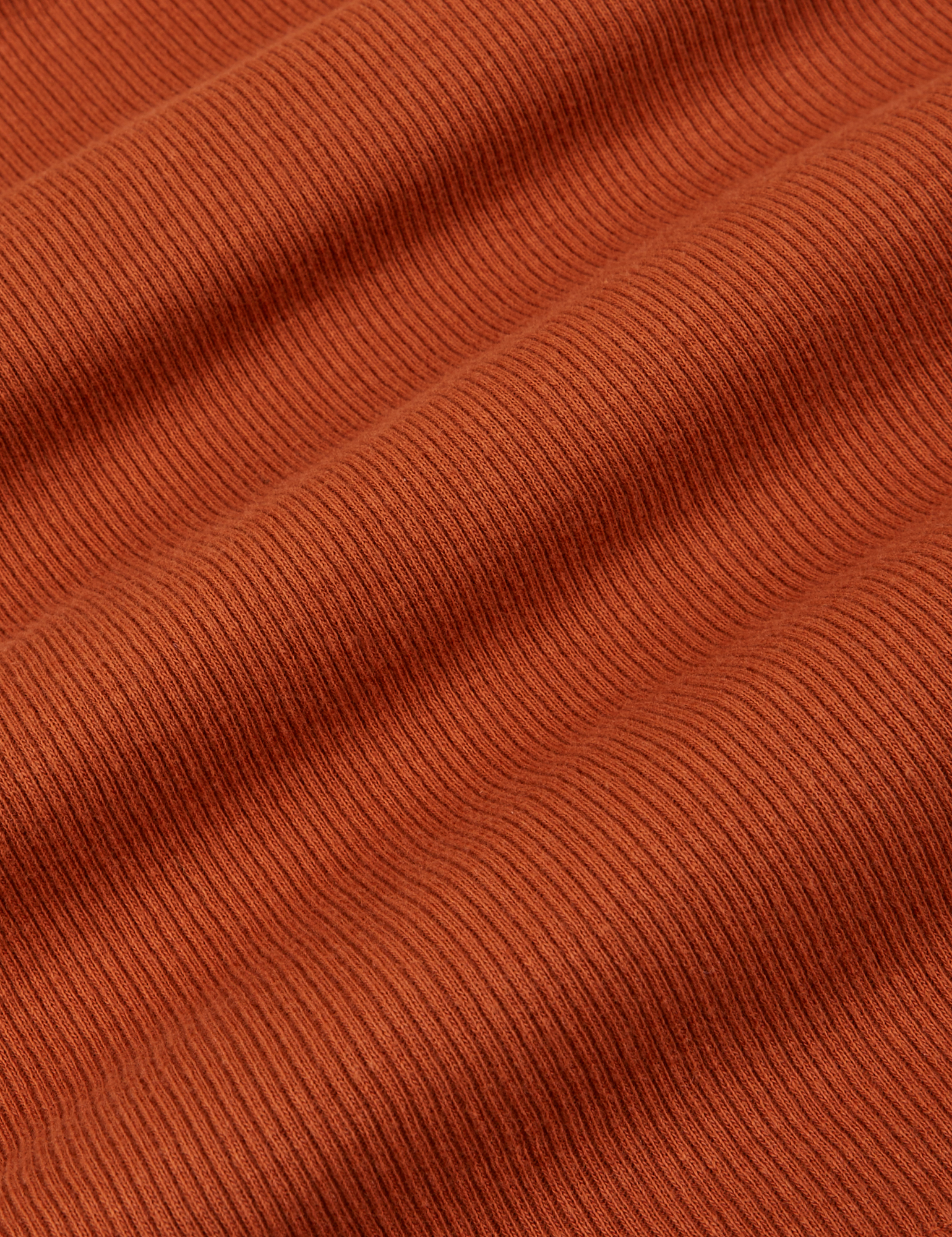 Muscle Tee in Burnt Terracotta fabric detail close up