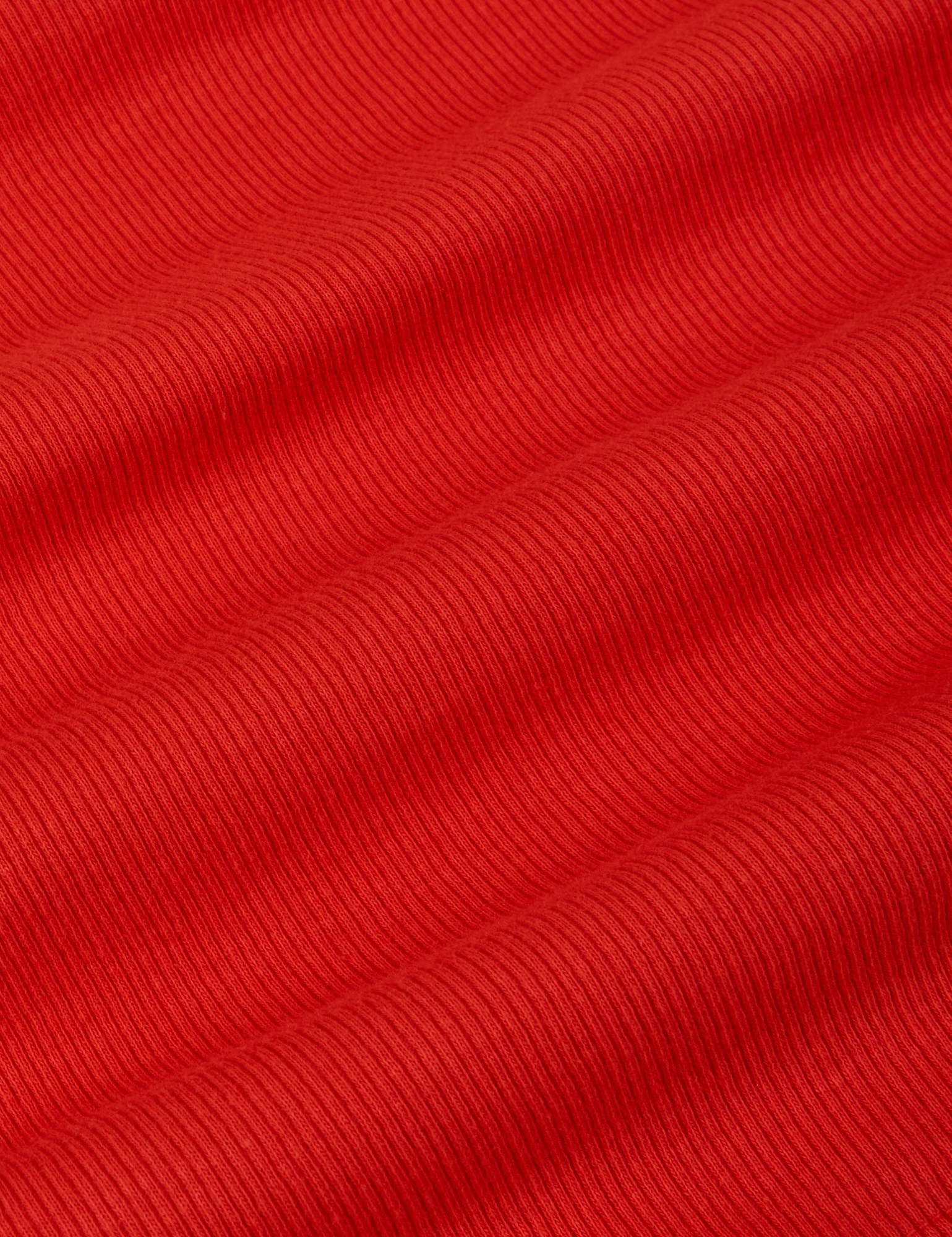 Muscle Tee in Mustang Red fabric detail close up