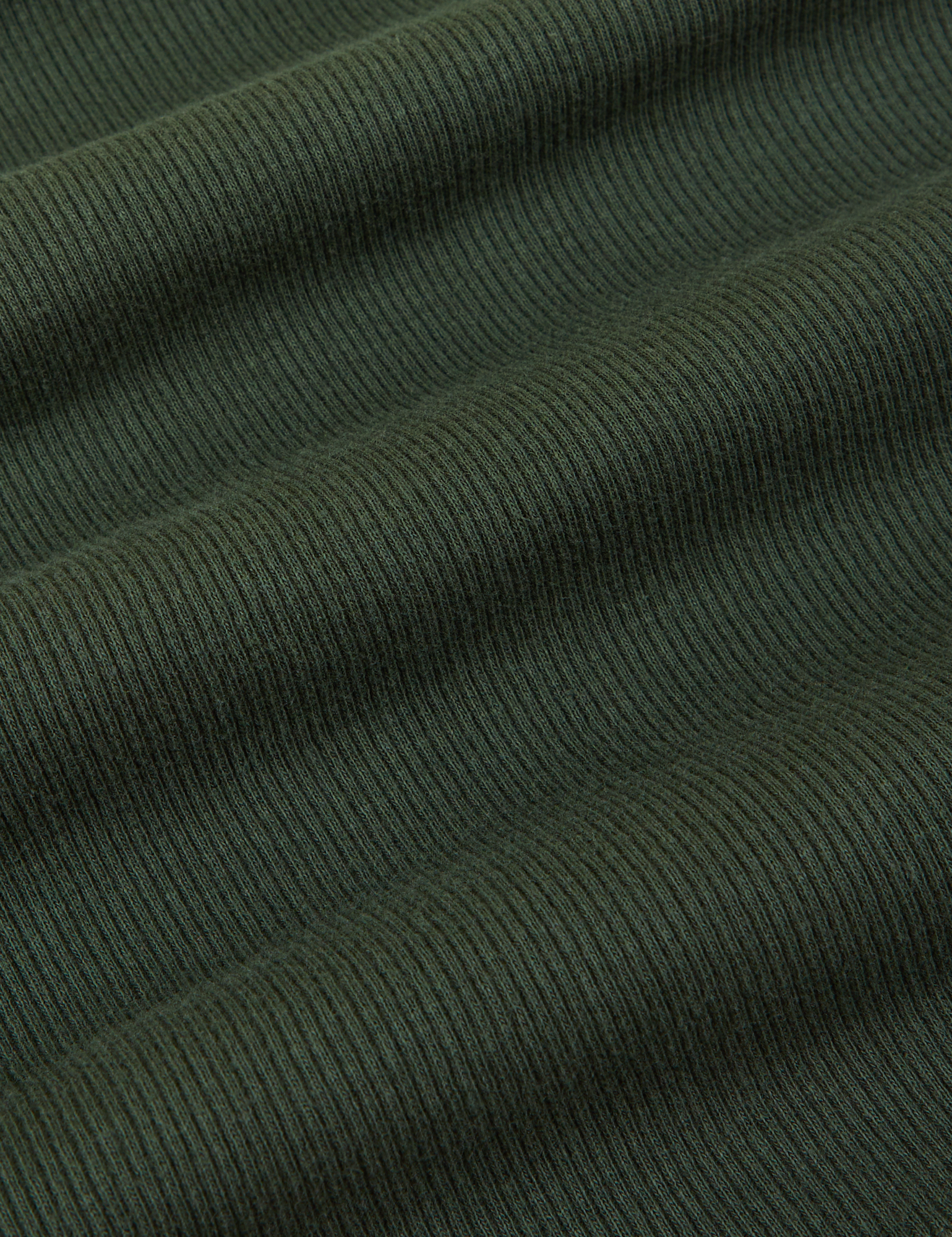 Muscle Tee in Swamp Green fabric detail close up
