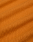 Muscle Tee in Creamsicle Orange fabric detail close up