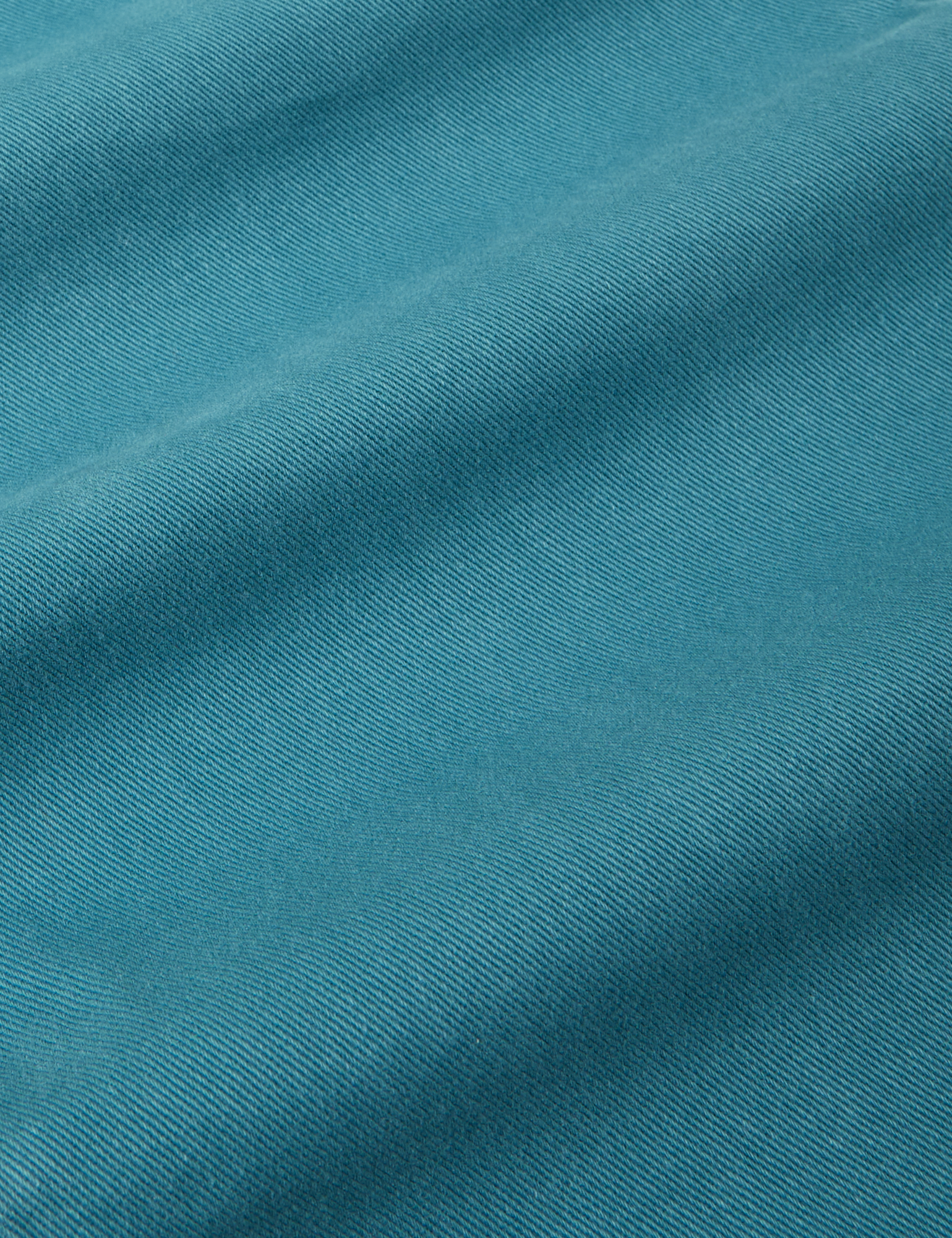 Short Sleeve Jumpsuit in Marine Blue fabric detail close up