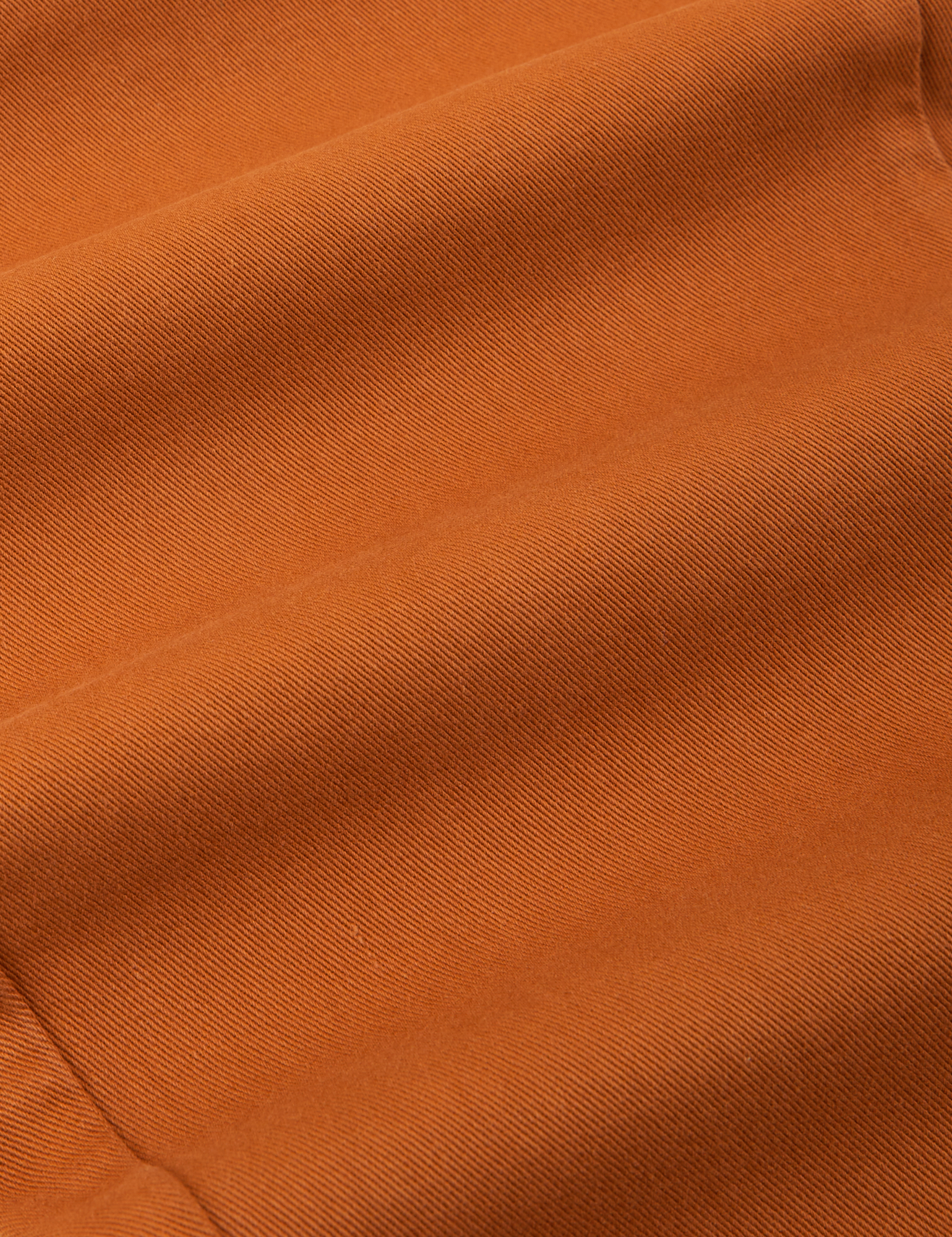 Pencil Pants in Burnt Terracotta fabric detail close up