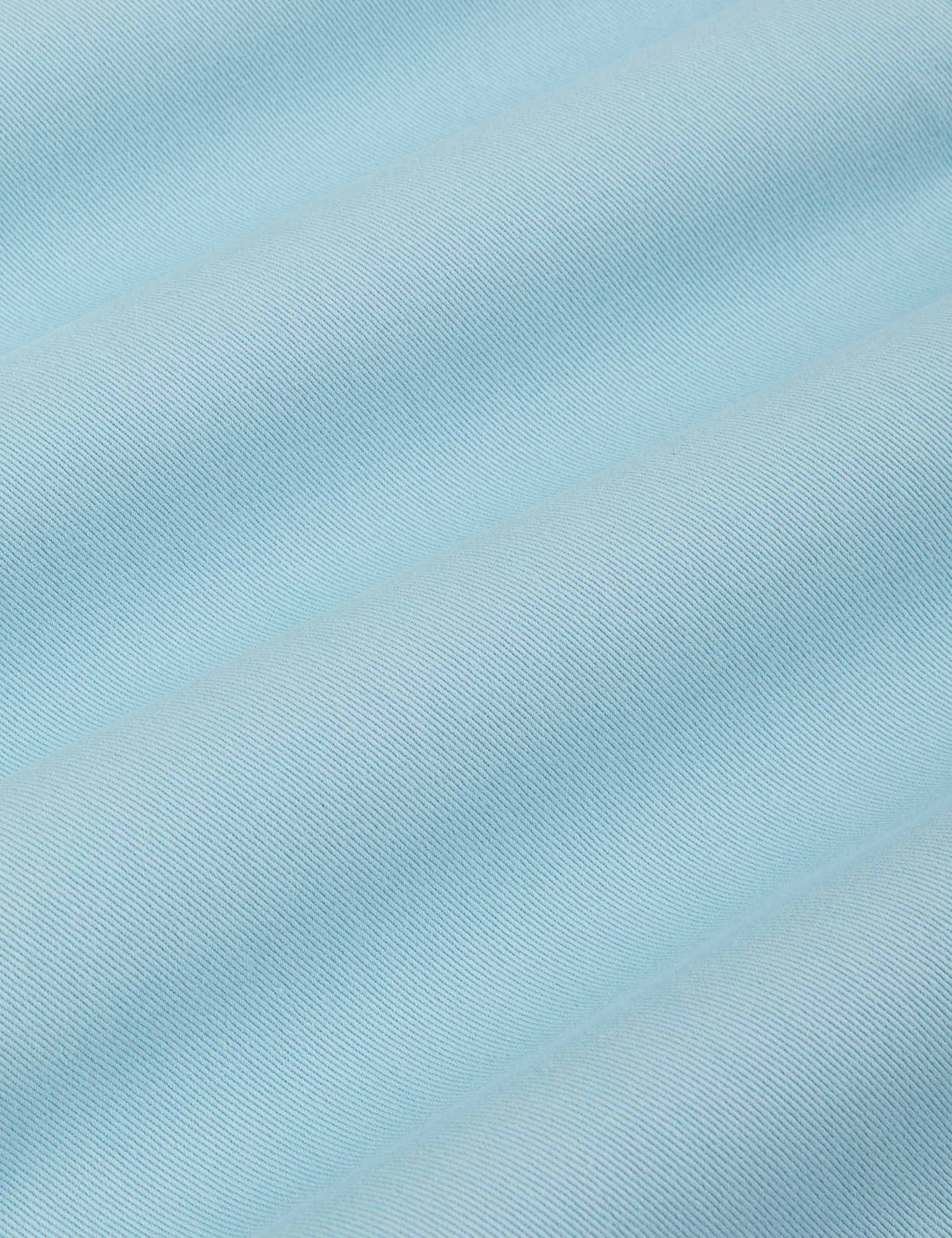 Short Sleeve Jumpsuit in Baby Blue fabric detail close up