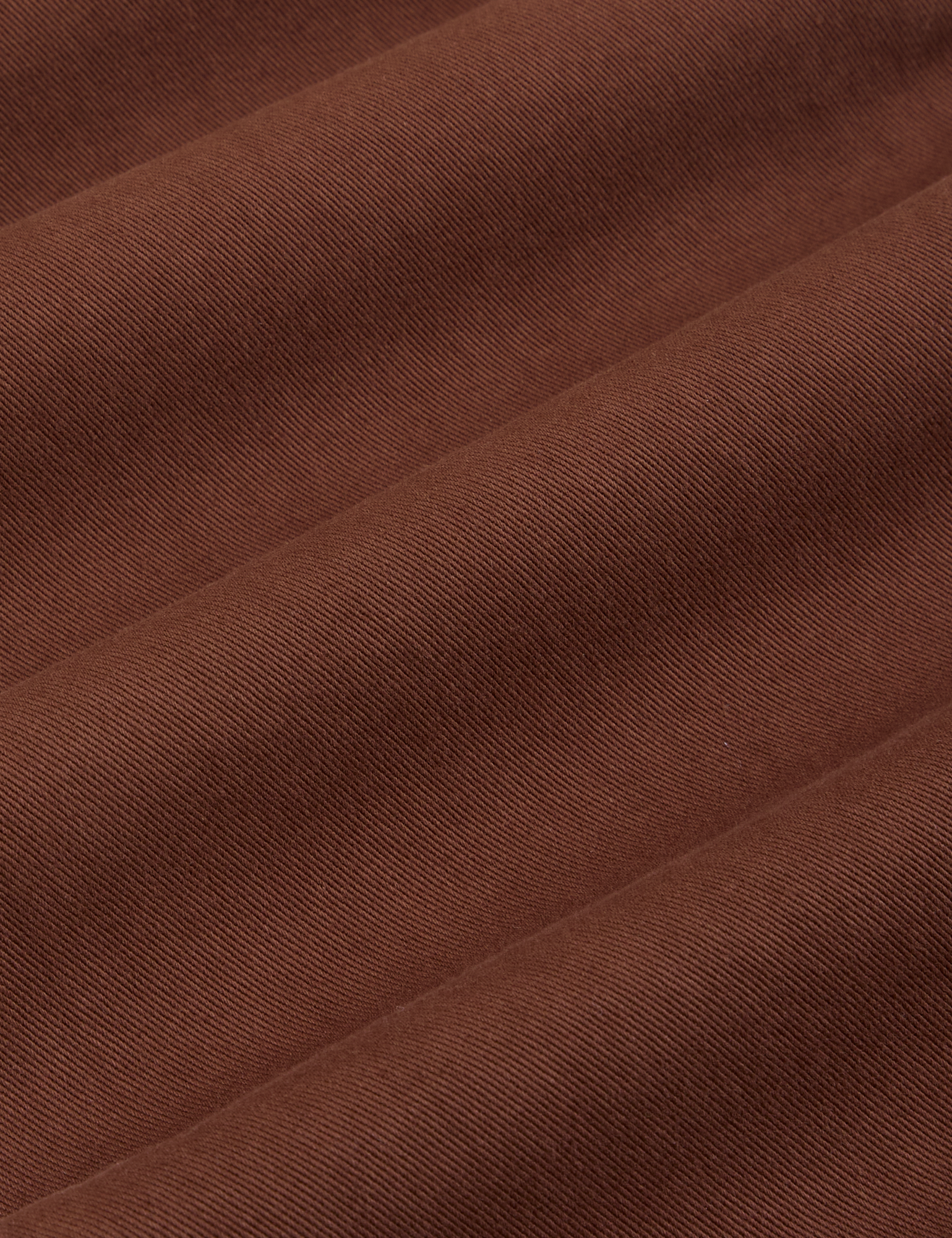 Short Sleeve Jumpsuit in Fudgesicle Brown fabric detail close up