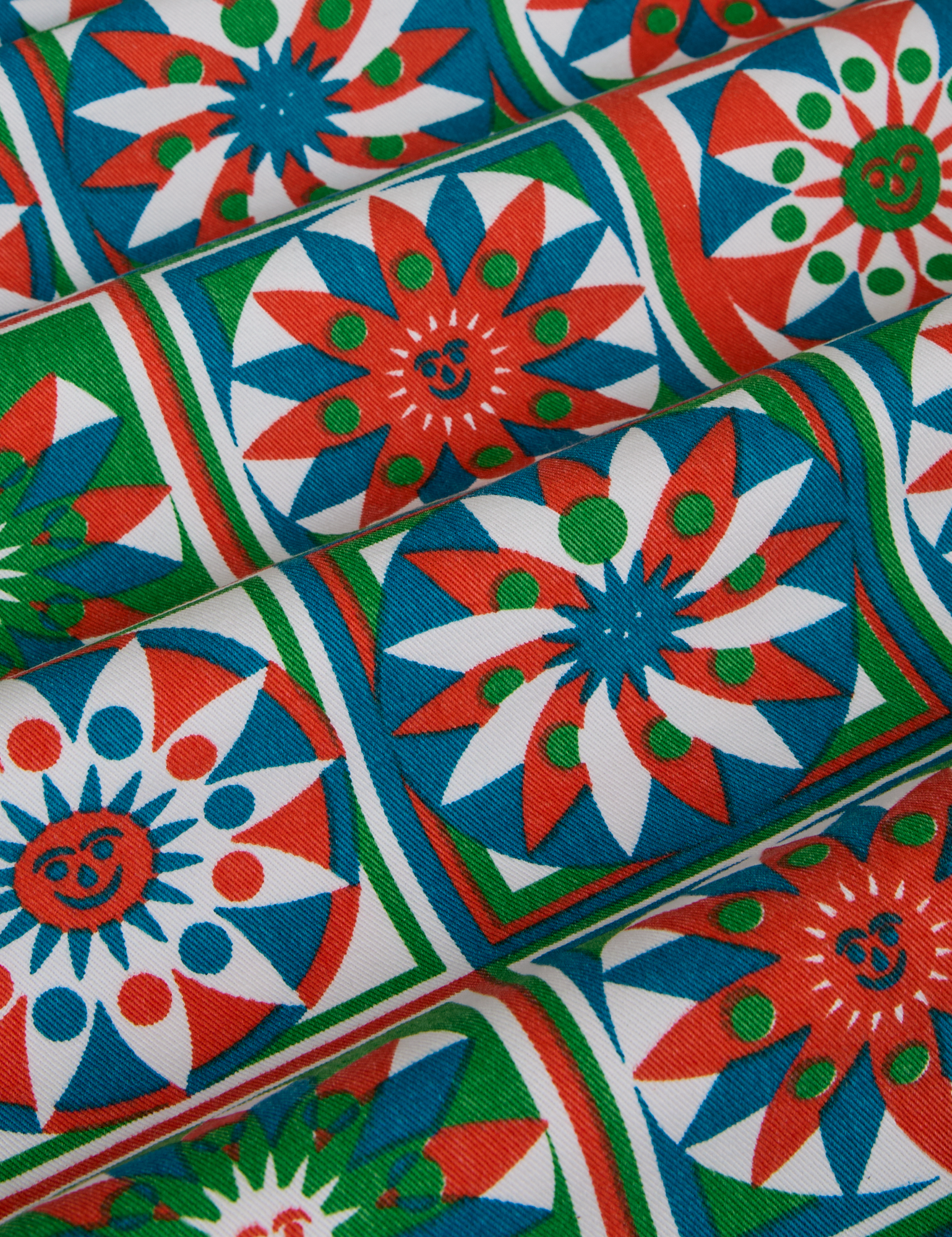 Work Pants in Quilt Print close up of blue, green, red and white print