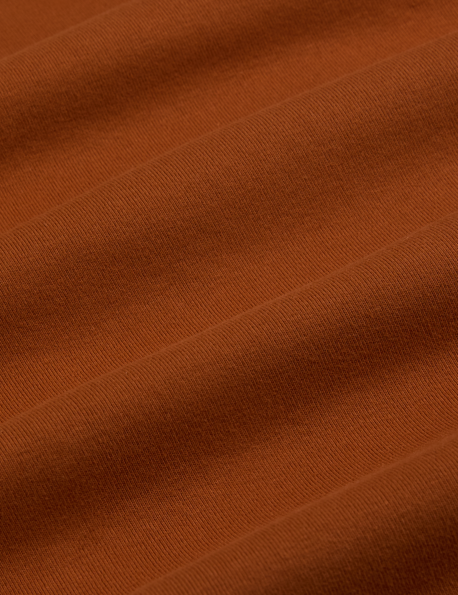 Racerback Tank in Burnt Terracotta fabric detail close up