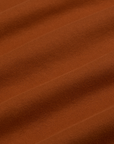 Racerback Tank in Burnt Terracotta fabric detail close up