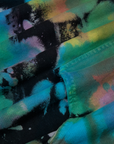 Oversized Hoodie in Rainbow Magic Waters fabric detail close up. Tie Dyed in green, blue, yellow, purple, pink and orange.