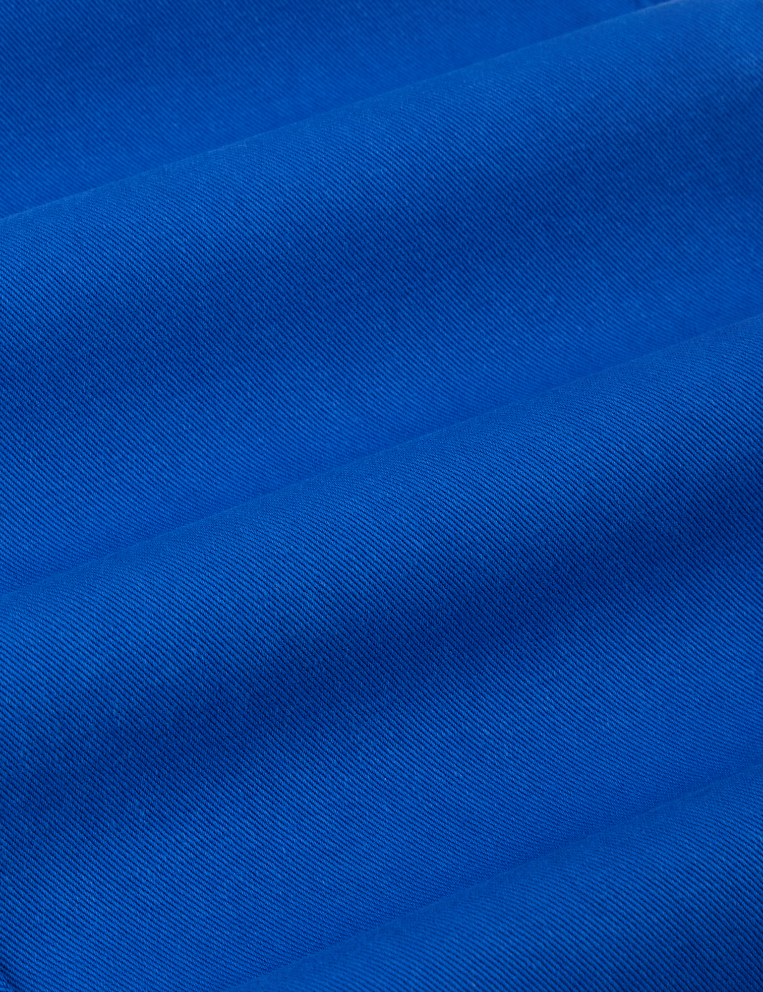 Short Sleeve Jumpsuit in Royal Blue fabric detail close up