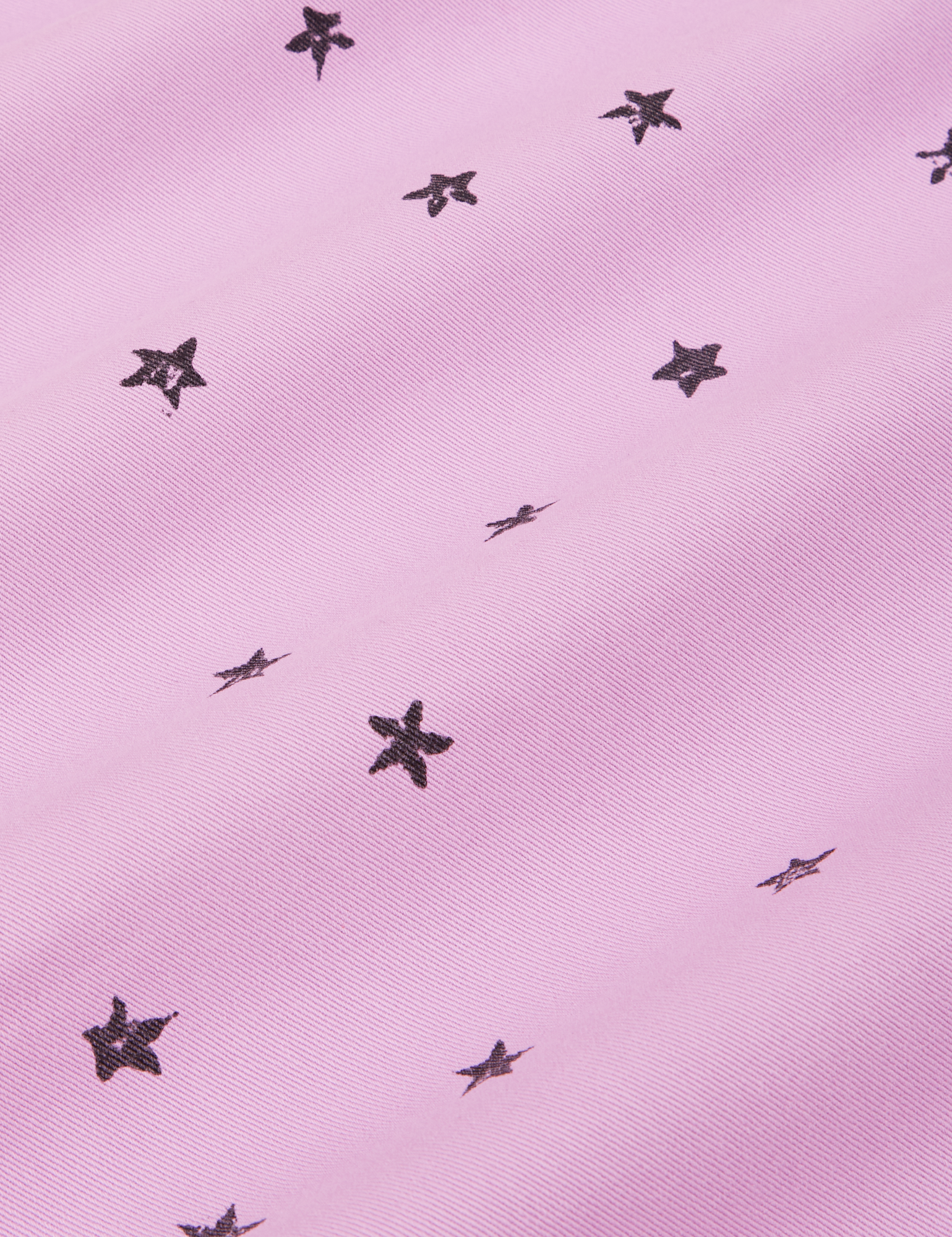 Star Bell Bottoms in Lilac Purple fabric detail. Handstamped little stars on the fabric.