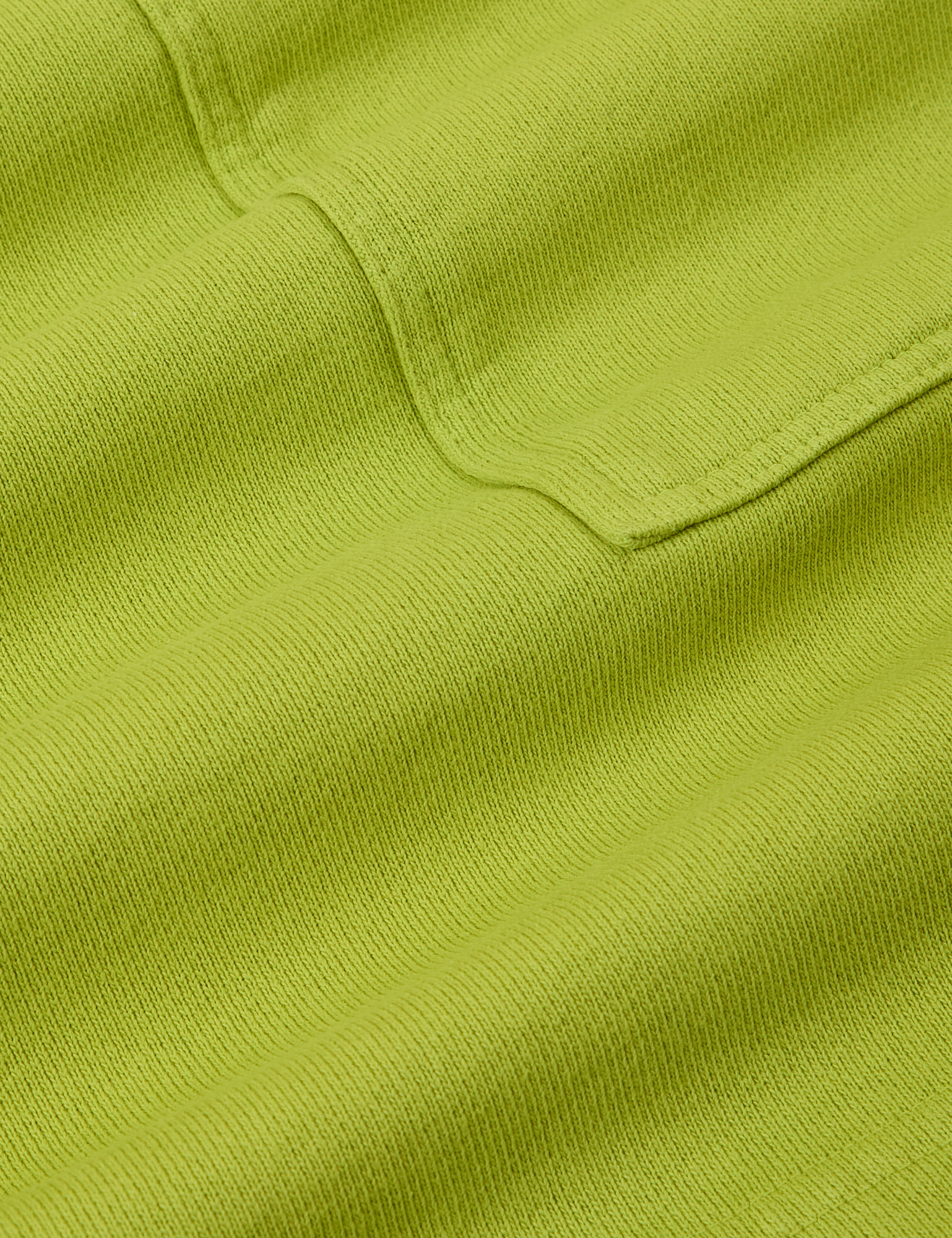 Sweat Shorts in Gross Green fabric detail close up