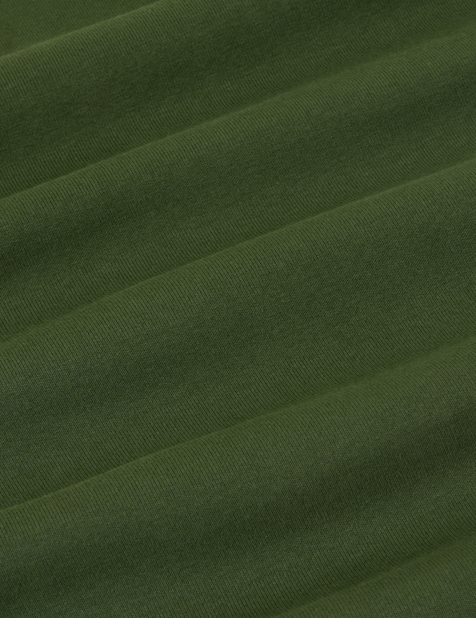 Tank Top in Dark Emerald Green fabric detail close up