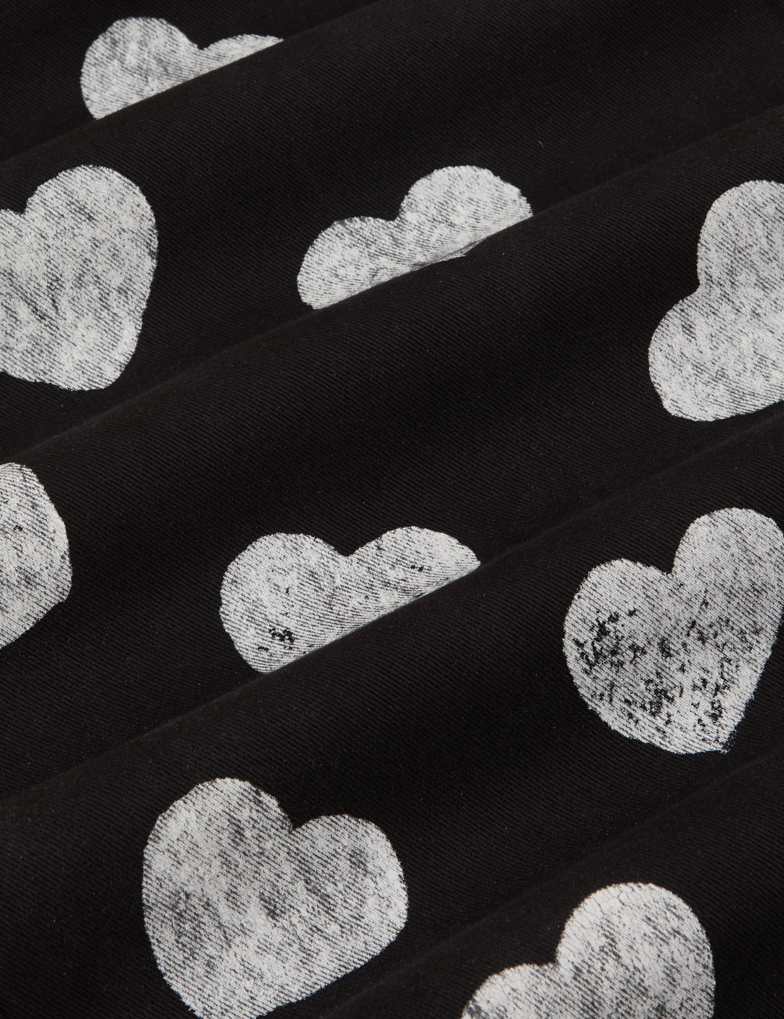 Paintstamped Heart Work Pants in Black fabric detail close up