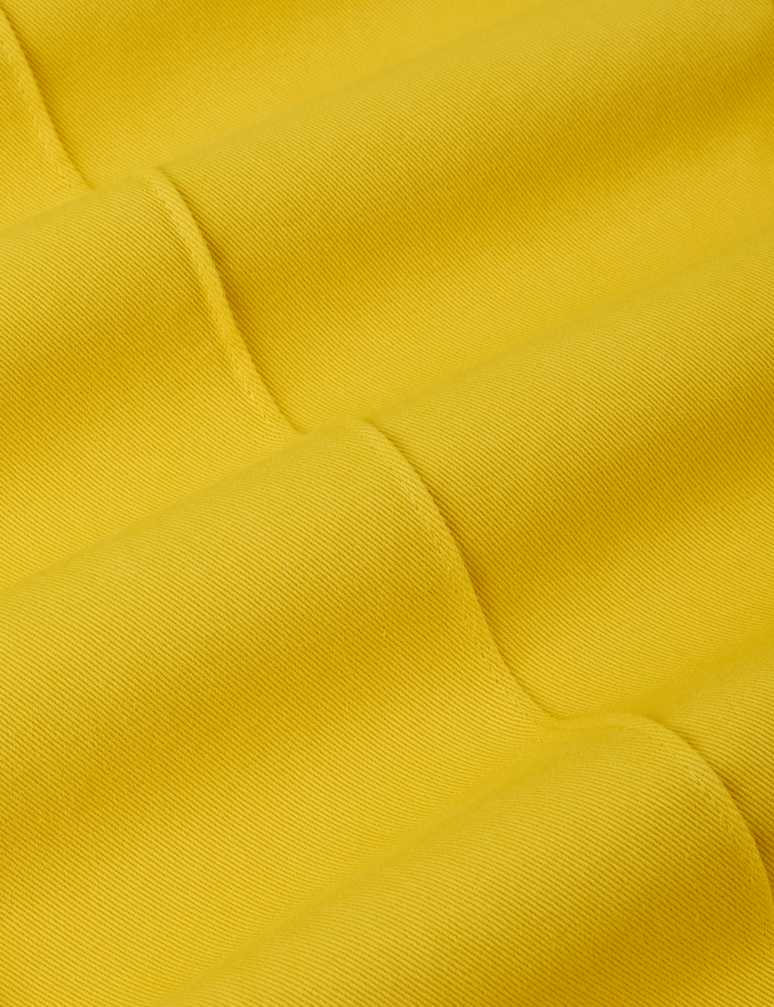 Western Pants in Golden Yellow fabric detail close up