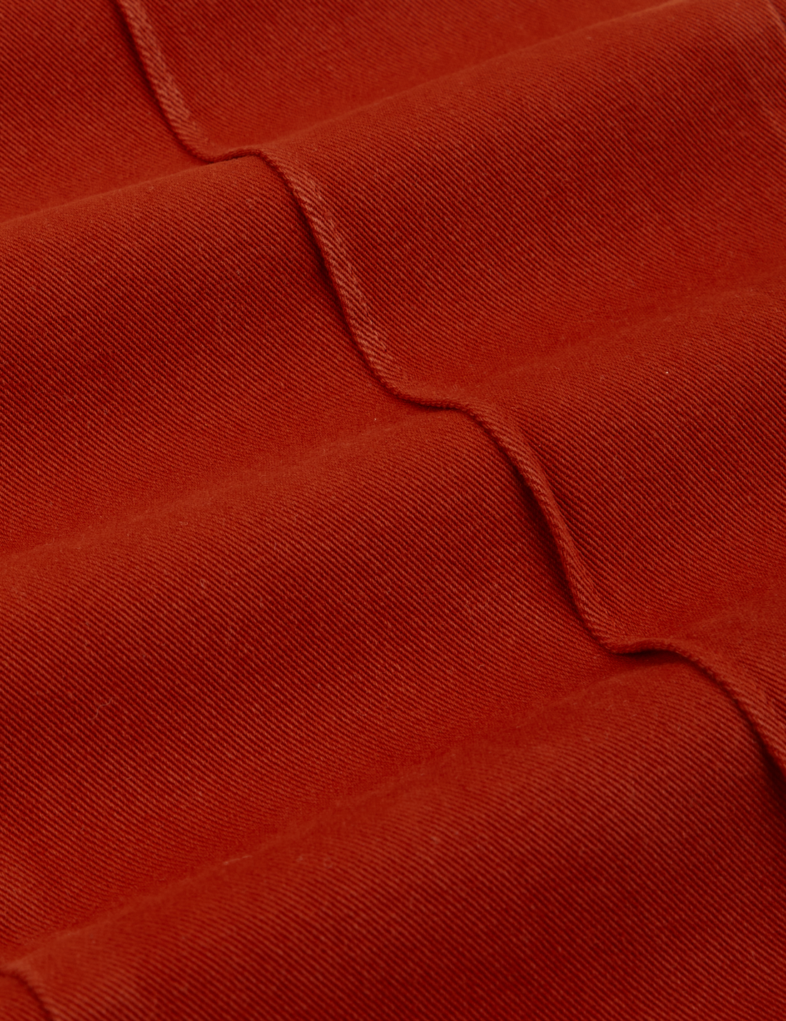 Western Pants in Paprika fabric detail close up.