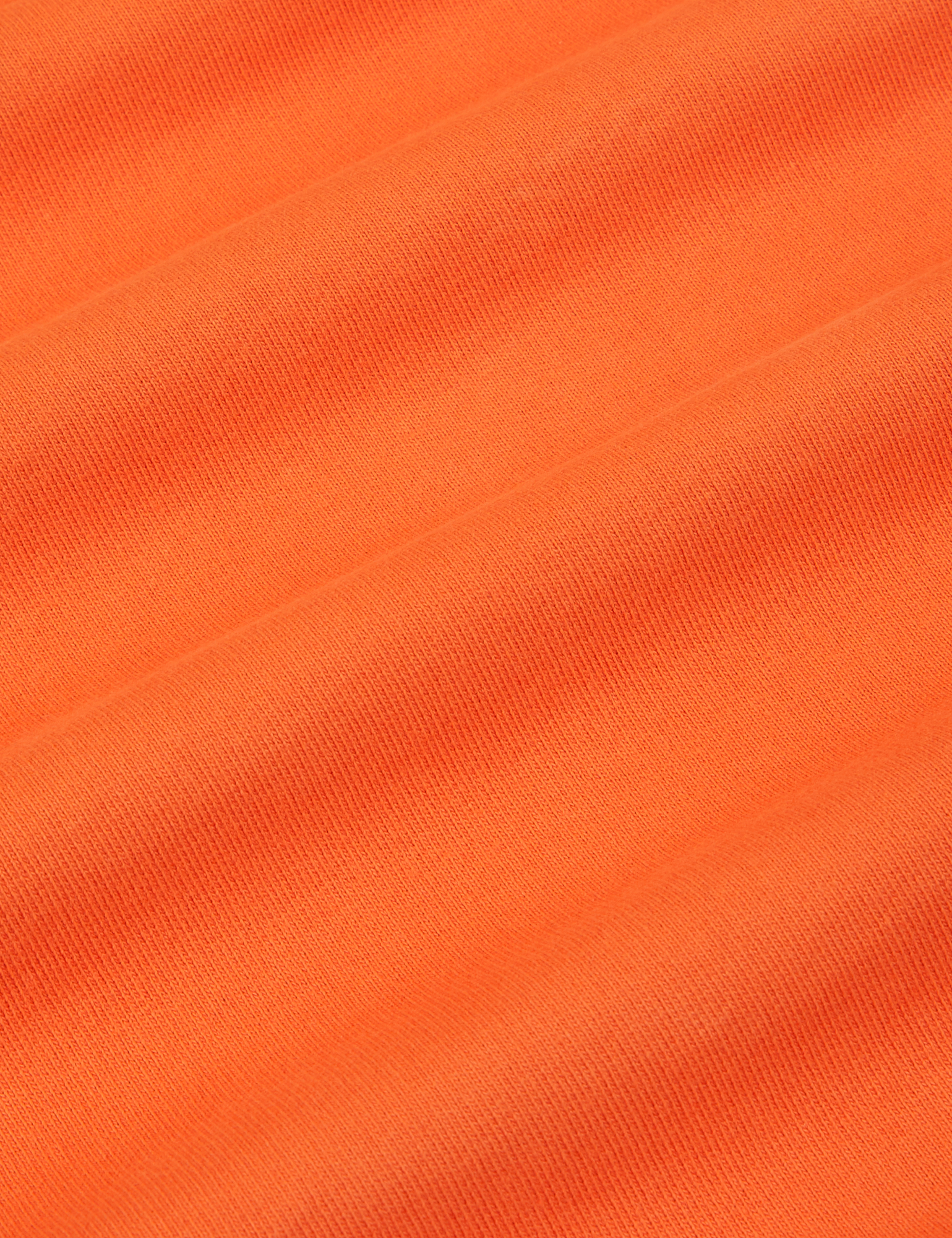 Wide Leg Sweat Pants in Sunset Orange fabric detail close up