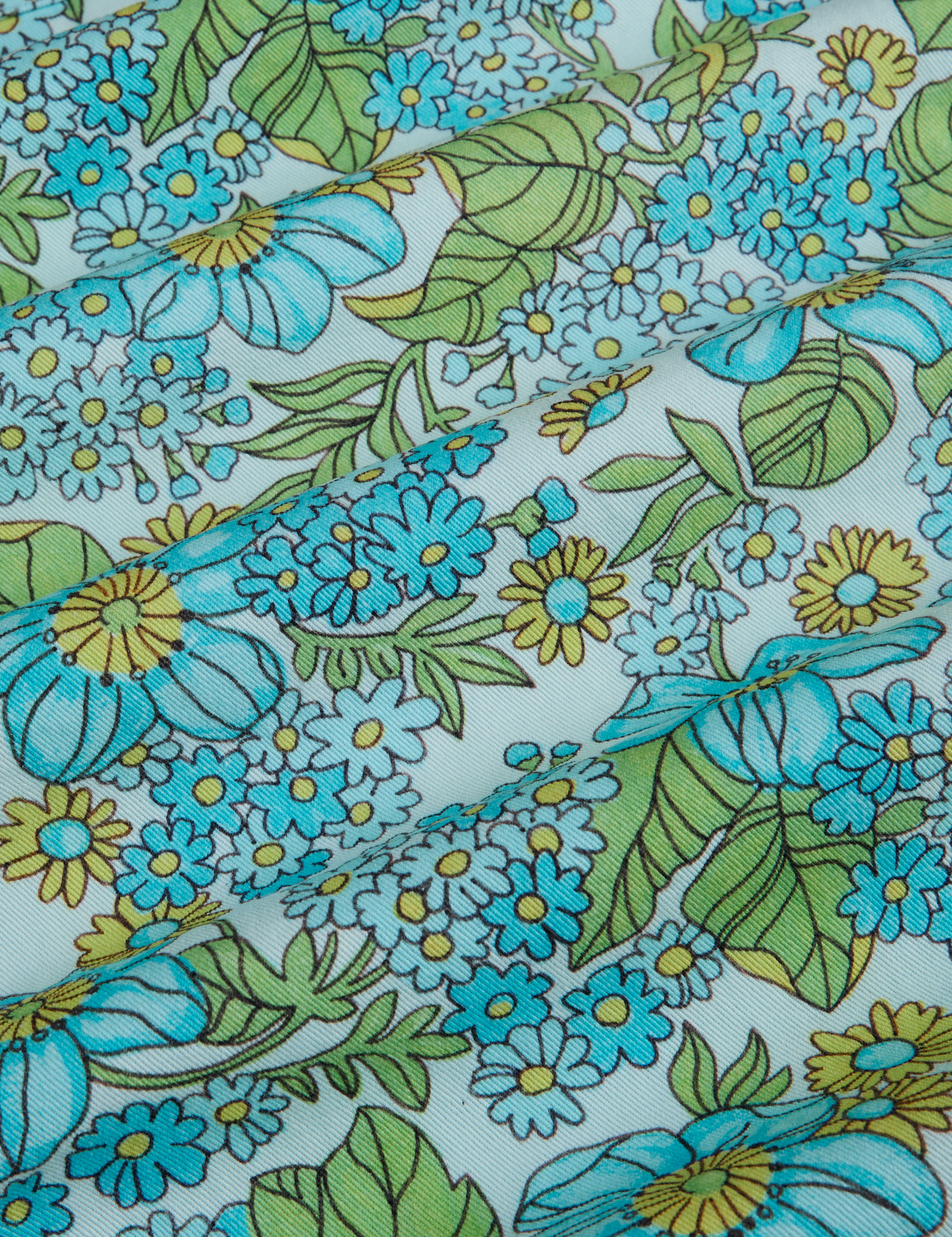 Winter Floral Print Work Pants close up of aqua and yellow flowers with green leaves