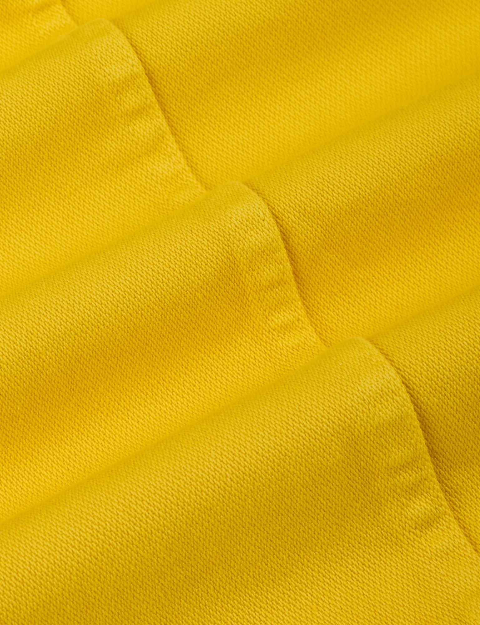 Denim Work Jacket in Golden Yellow fabric detail close up