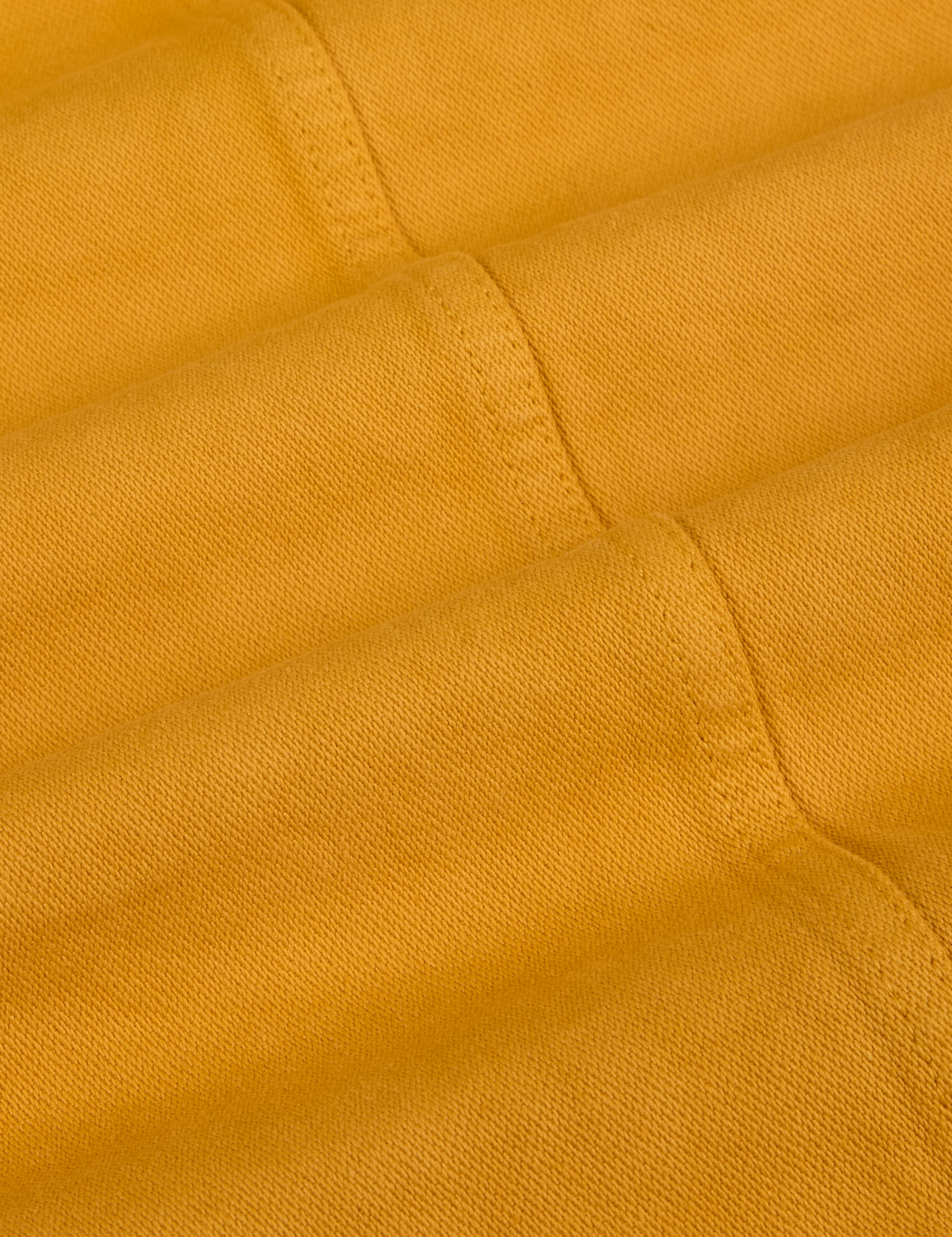 Denim Work Jacket in Mustard Yellow fabric detail close up