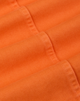 Denim Work Jacket in Construction Orange fabric detail close up