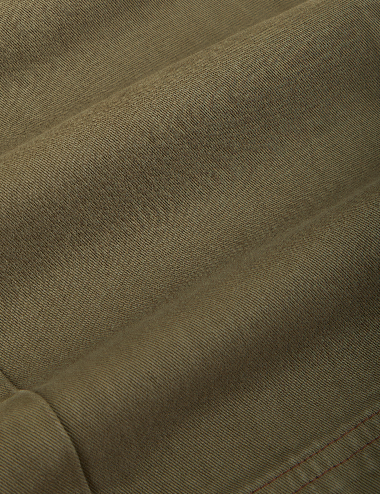 Work Pants in Surplus Green fabric detail close up
