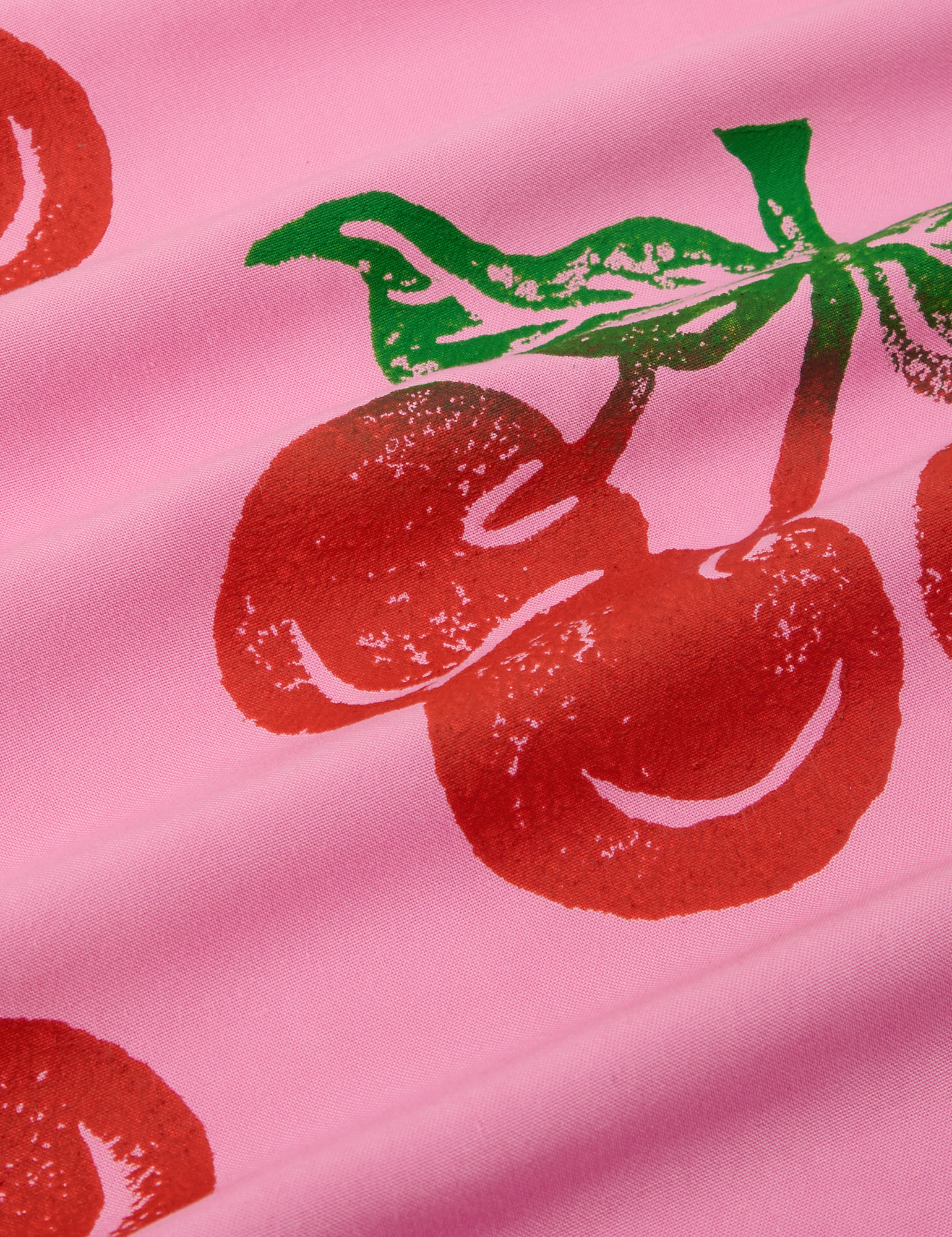 Cherry Pantry Button-Up close up of paintstamped red cherries with green stem