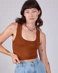 Alex is wearing Cropped Tank Top in Burnt Terracotta