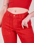 Mid-Rise Work Pants in Mustang Red close up on Alex