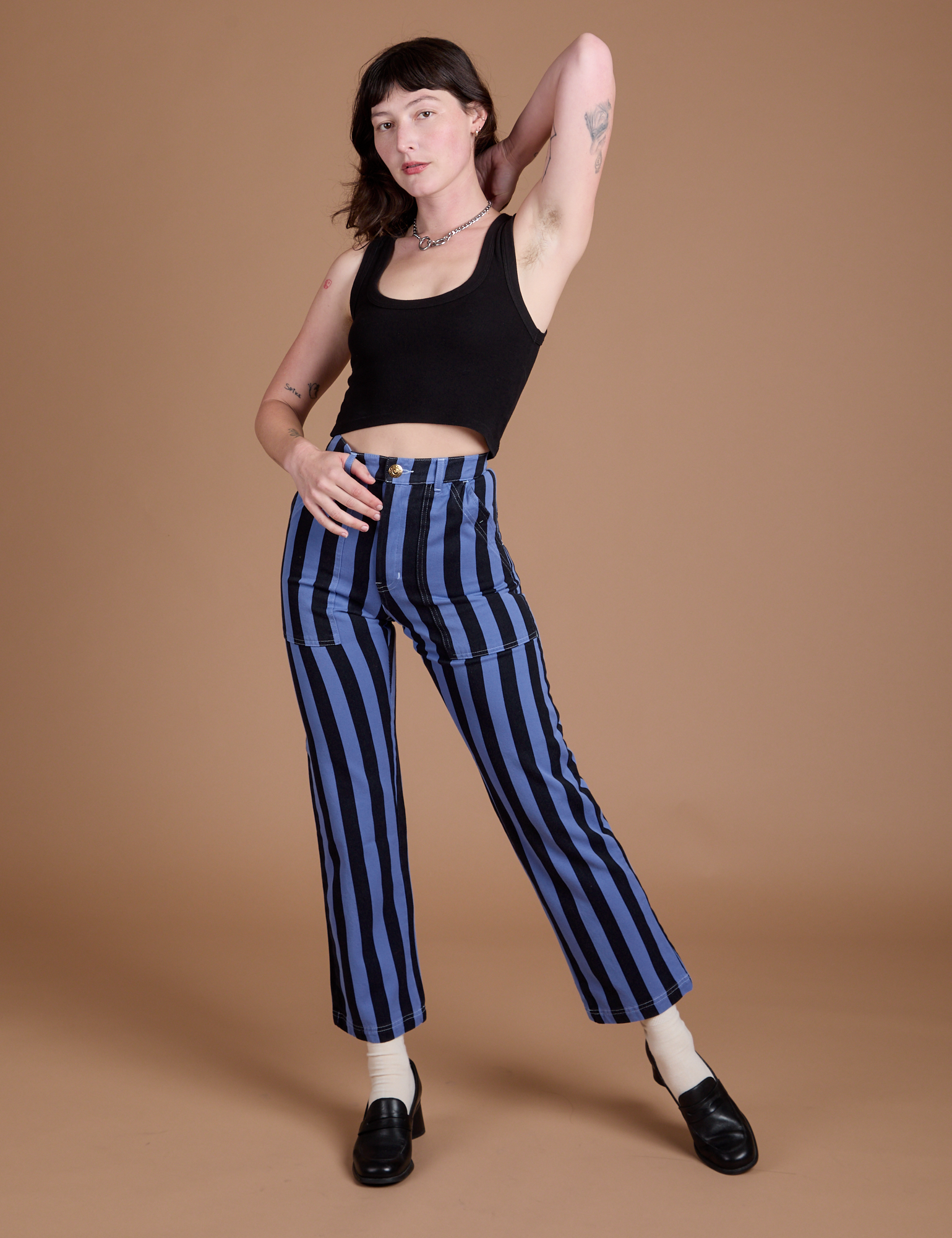 Black Stripe Work Pants in Cornflower Blue and black Cropped Tank on Alex