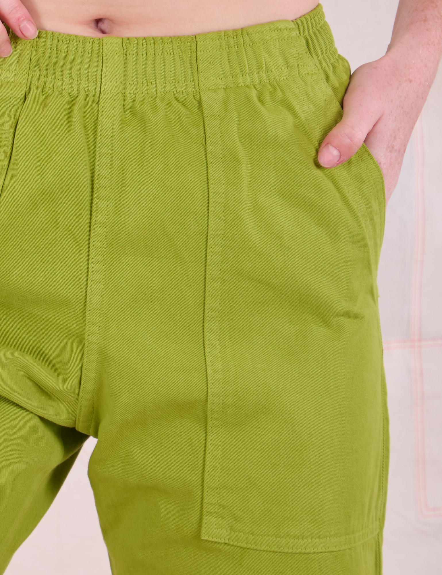 Action Pants in Gross Green front close up on Margaret