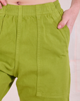 Action Pants in Gross Green front close up on Margaret