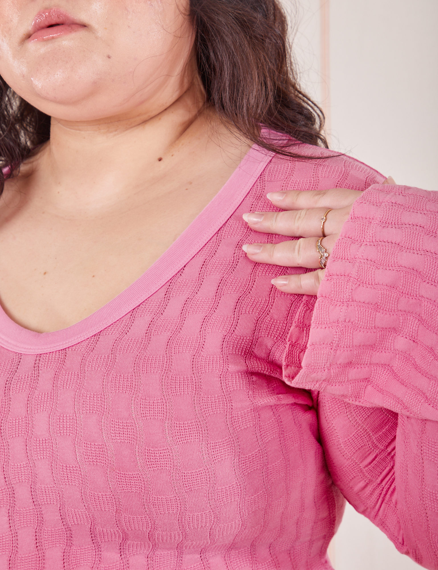 Front close up of Bell Sleeve Top in Bubblegum Pink worn by Ashley