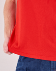 Burly Tee in Mustang Red bottom hem close up