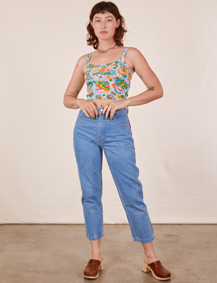 Alex is wearing Butterfly Bash Cami and light wash Frontier Jeans