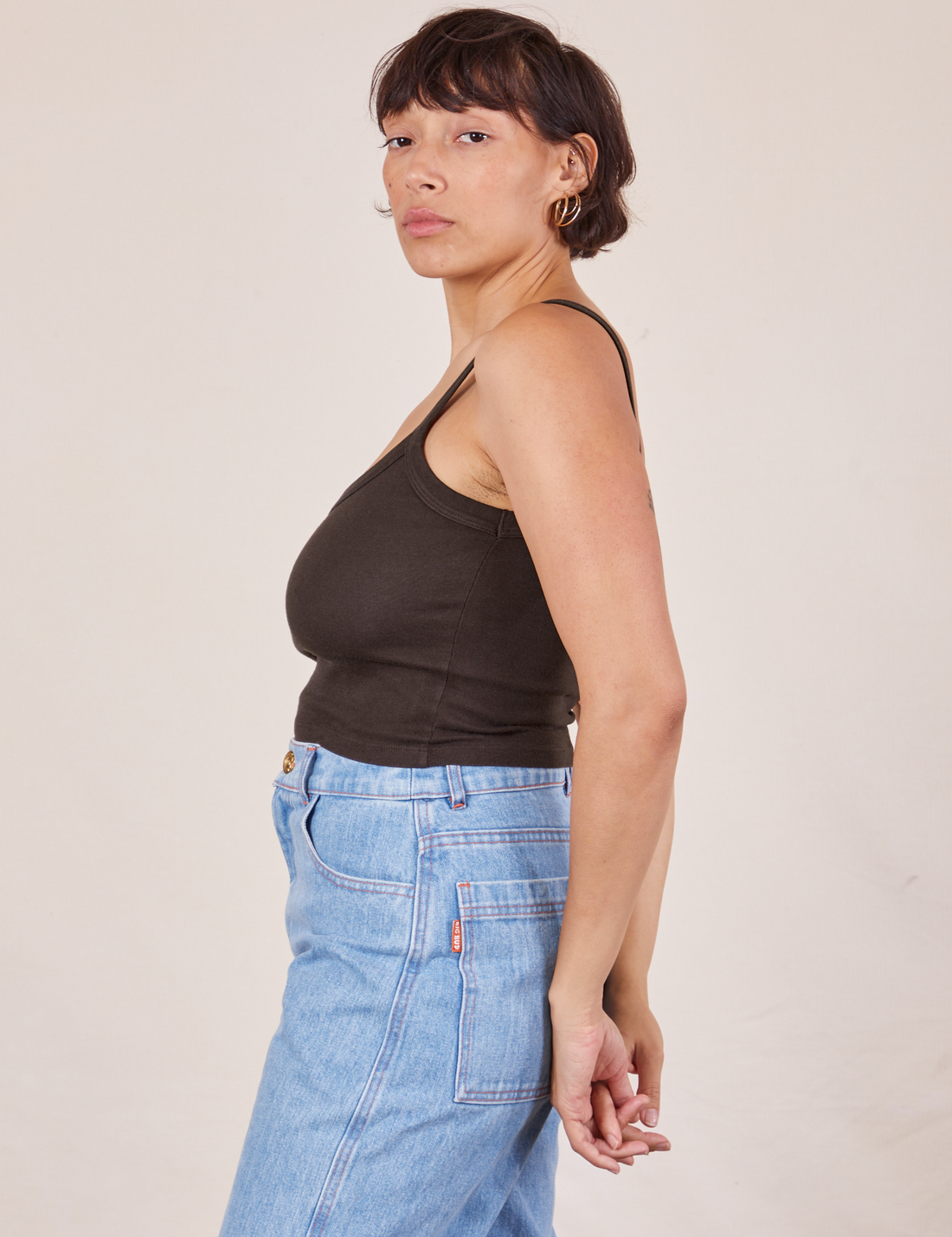 Side view of Cropped Cami in Espresso Brown and light wash Sailor Jeans worn by Tiara