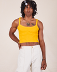 Jerrod is wearing Cropped Cami in Sunshine Yellow and vintage off-white Western Pants