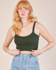 Margaret is wearing Cropped Cami in Swamp Green