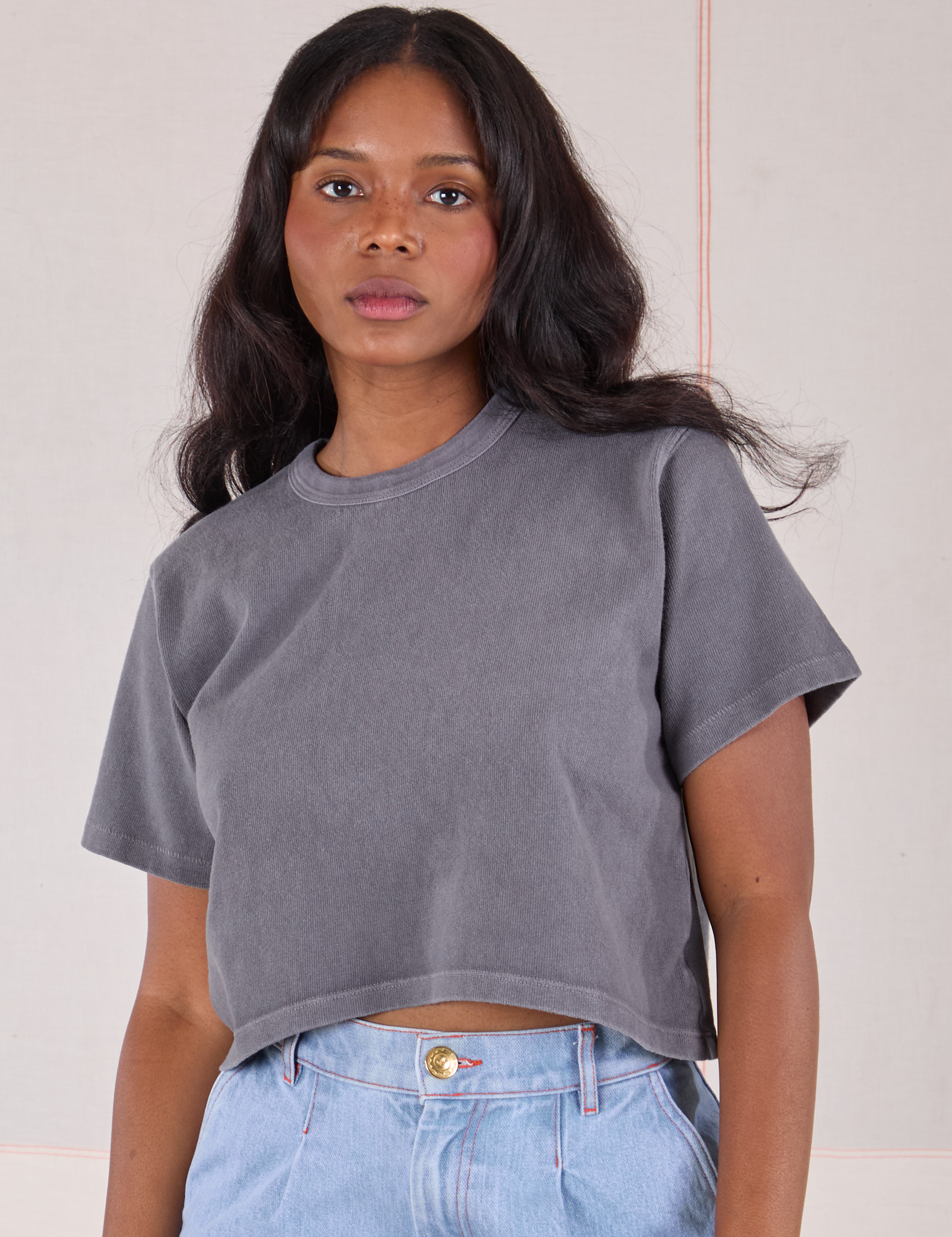 Kandia is wearing Cropped Burly Tee in Washed Grey