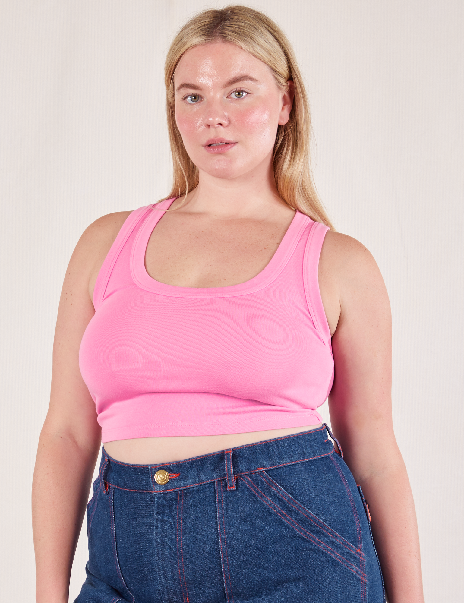 Lish is 5'8" and wearing S Cropped Tank Top in Bubblegum Pink