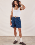 Jesse is wearing Denim Trouser Shorts in Dark Wash paired with Cropped Tank in vintage tee off-white