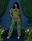 Kandia is 5'3" and wearing P Pond Party Print Jumpsuit