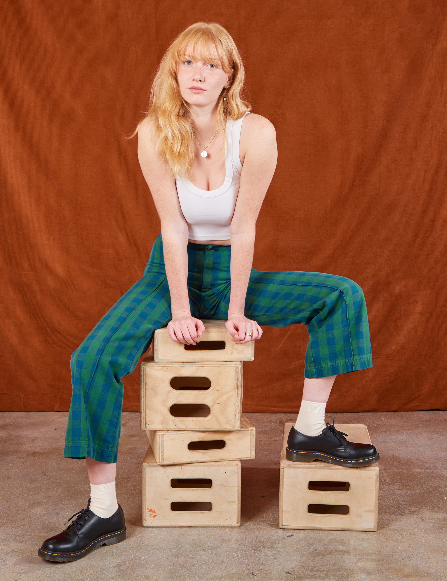 Margaret is wearing Gingham Western Pants in Green and Cropped Tank in vintage tee off-white